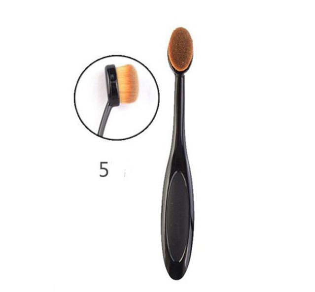 Black oval makeup brush with dense soft brown bristles and ergonomic handle for smooth foundation blending, contouring, concealer and flawless makeup application