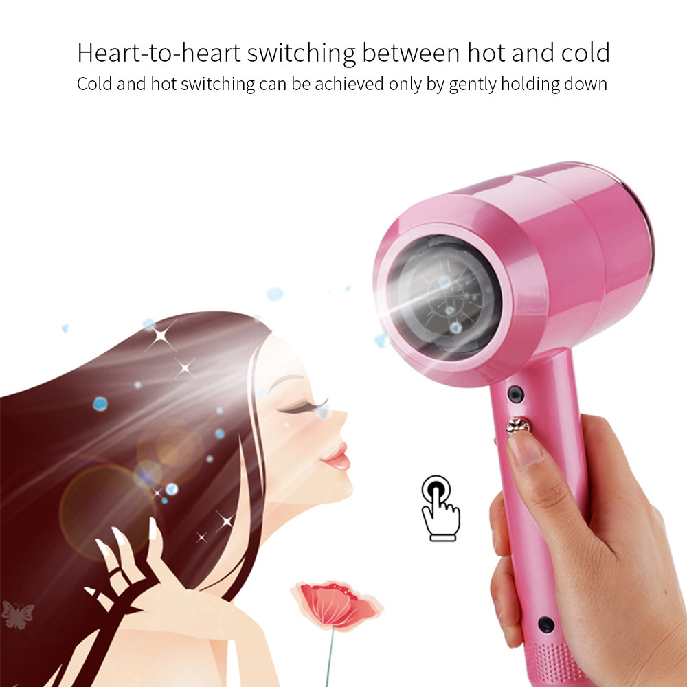 Pink hair dryer being used on a person with text about hot and cold switching.