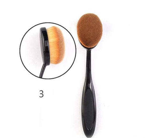 Oval makeup brush with ultra-soft dense brown bristles and sleek black handle for smooth foundation blending, contouring, concealer and flawless face makeup application