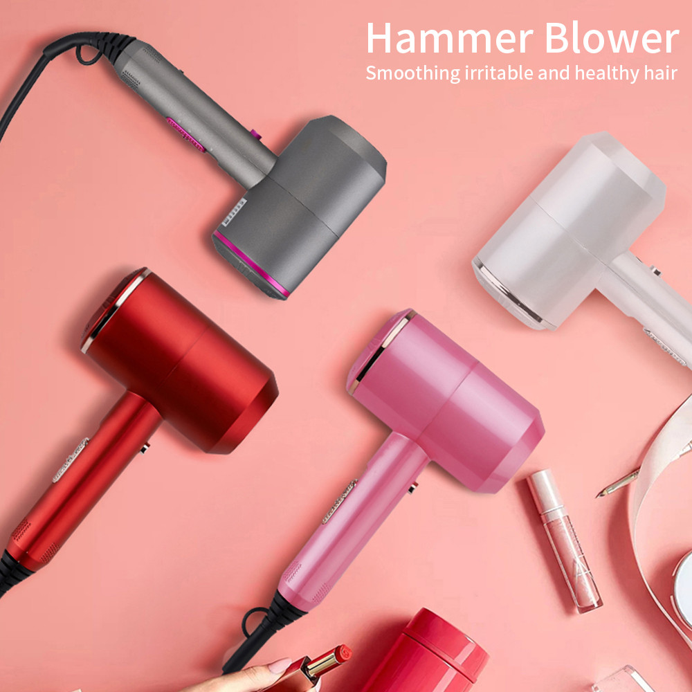 Four hair dryers in red, pink, gray, and white on a pink background with text 'Hammer Blower' and 'Smoothing irritable and healthy hair'.