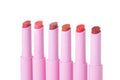 Lip Luv’d tinted lip balm set featuring six moisturizing lip colors in Sunkiss’d, Girly Guava, Blush’d, Spice, Blossom’d and Bashful shades in pink tubes.