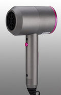 Gray hair dryer with pink accents on a light gray background