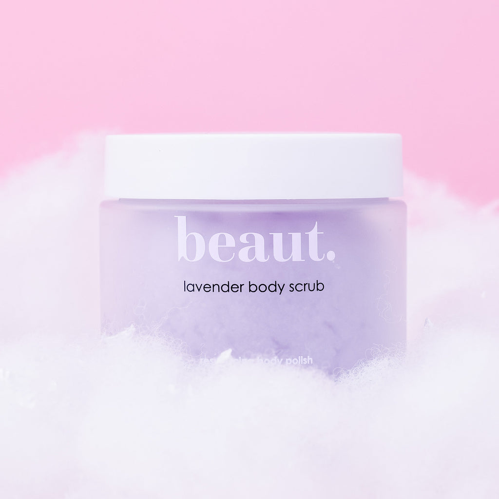 Beaut. Lavender Body Scrub – exfoliating body polish in a lavender jar with white lid, luxury skincare for smooth, soft, radiant skin