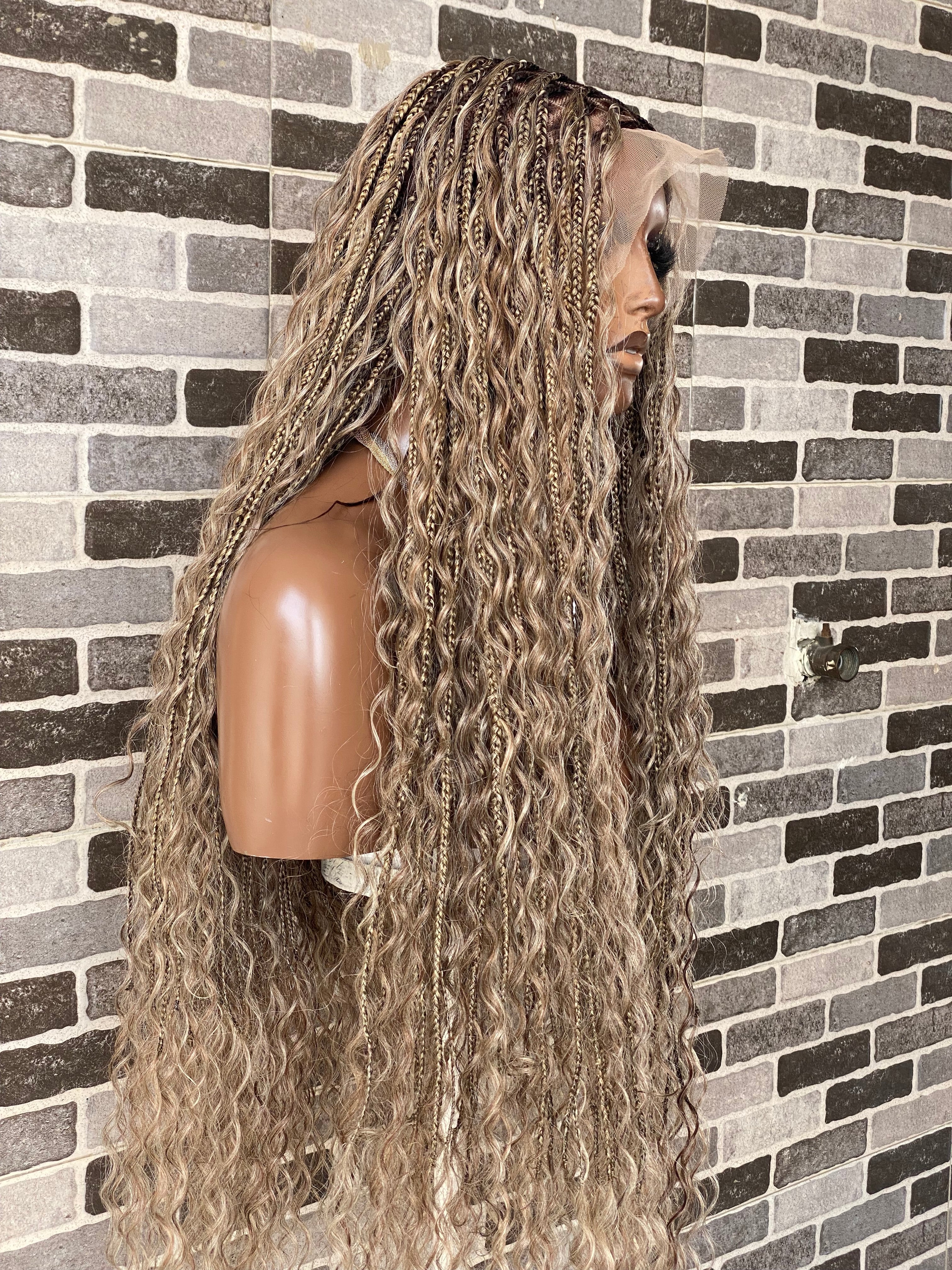 Mannequin with long, wavy hair against a brick wall. Bohemian Knotles custom color Full lace wig (Mix color)