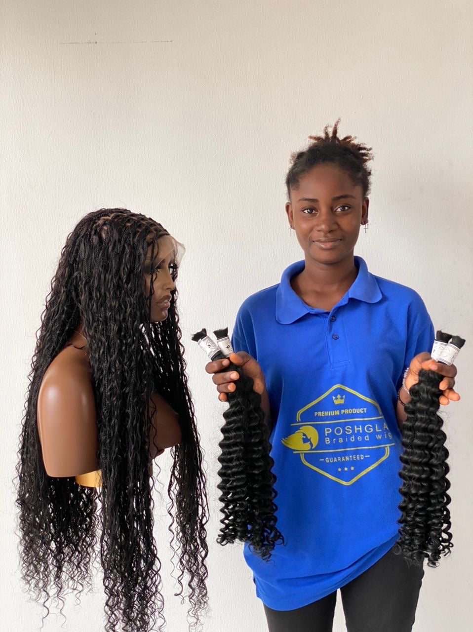 Person holding hair extensions with a mannequin displaying styled hair against a white background. Bohemian humanhair Knotless-Ready to ship (Tara)