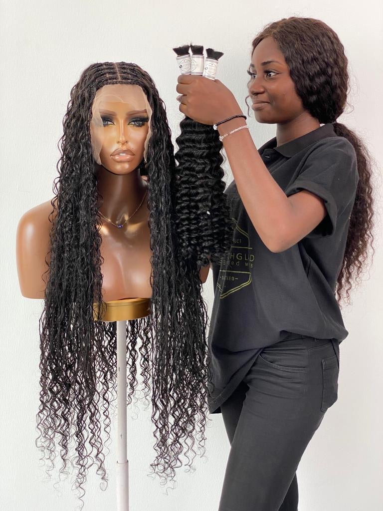 Person holding a bundle of hair extensions next to a mannequin with long hair on a white background. Bohemian humanhair Knotless-Ready to ship (Tara)