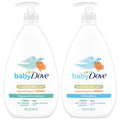 Two bottles of baby Dove sensitive skin care lotion on a white background