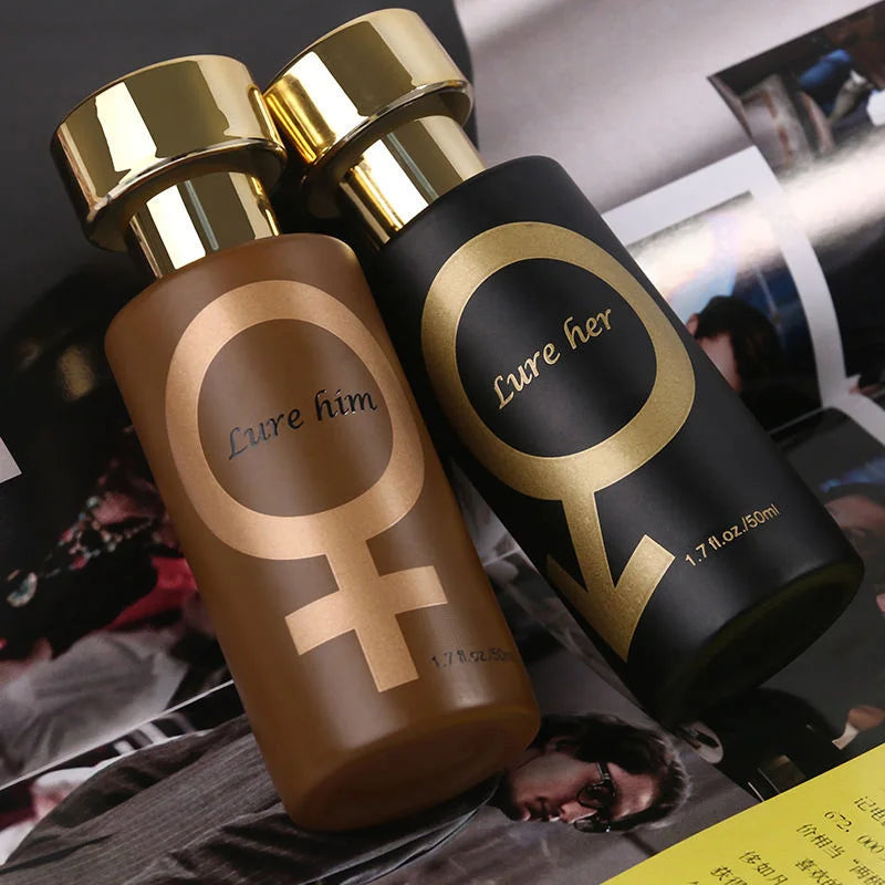 Two bottles labeled 'Lure him' and 'Lure her' with gold and black design on a blurred background.