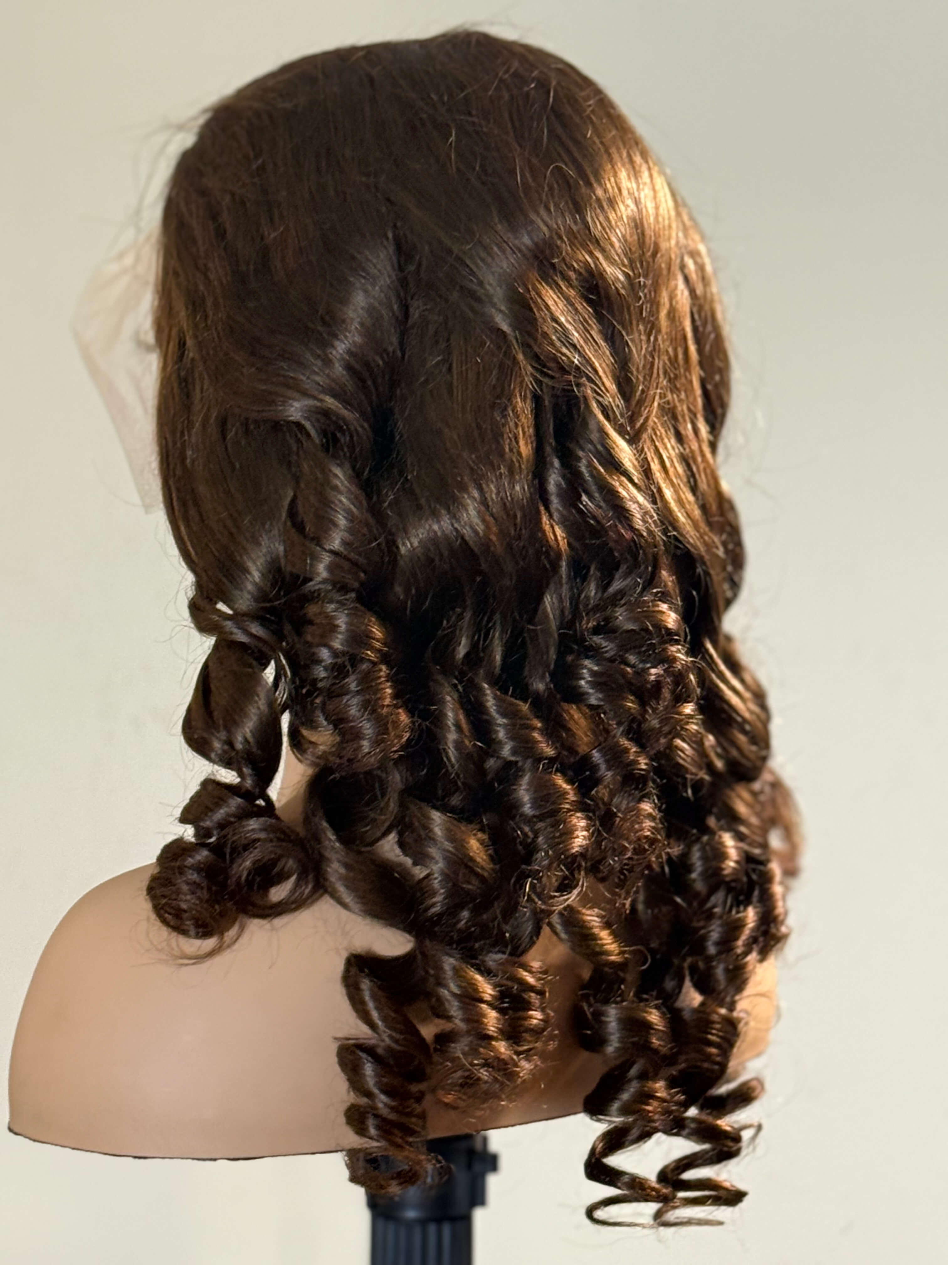 Mannequin head with braided brown hair on a white background brown sugar bounce, chocolate brown lace front wig, chocolate brown human hair wig, brown lace front wig, brown human hair wig, brunette wig, brunette lace front wig, chocolate wig, rich brown wig, mocha brown wig, caramel brown wig, warm brown wig, chocolate brown hair wig, long loose wave wig, loose wave human hair wig, loose wave lace wig, luxury brown wig, premium human hair wig, natural part wig, realistic lace front wig, seamless hairline wi