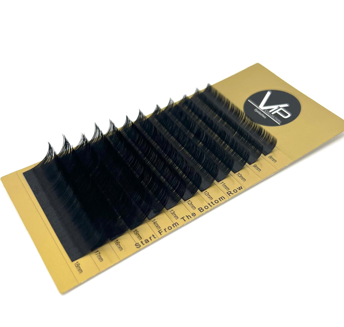 Set of false eyelashes on a yellow tray with a brand logo on a white background