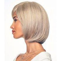 A woman shown in side profile wearing a short, straight, chin-length blonde wig with subtle grayish highlights, against a plain white background.
