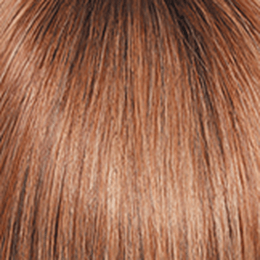 Close-up of straight hair in a warm coppery auburn shade, showing the texture and color of the hair strands.