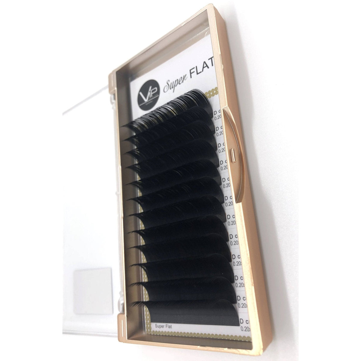 Set of false eyelashes in a gold and white box on a white background